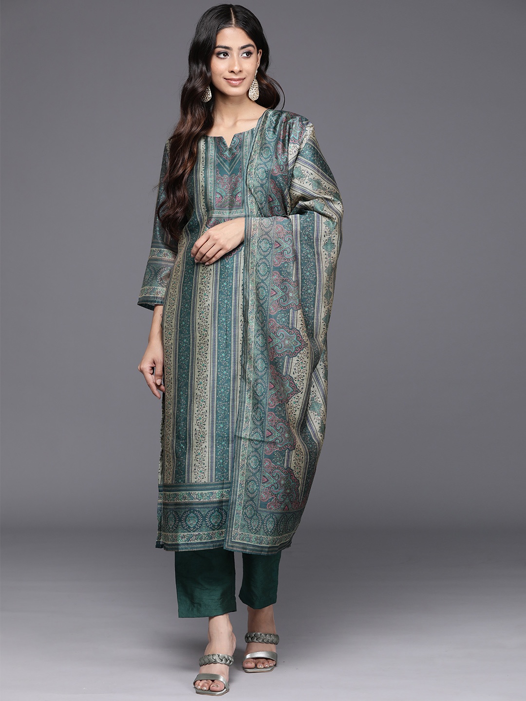 

Varanga Women Teal Ethnic Motifs Printed Regular Chanderi Silk Kurta with Trousers & With Dupatta