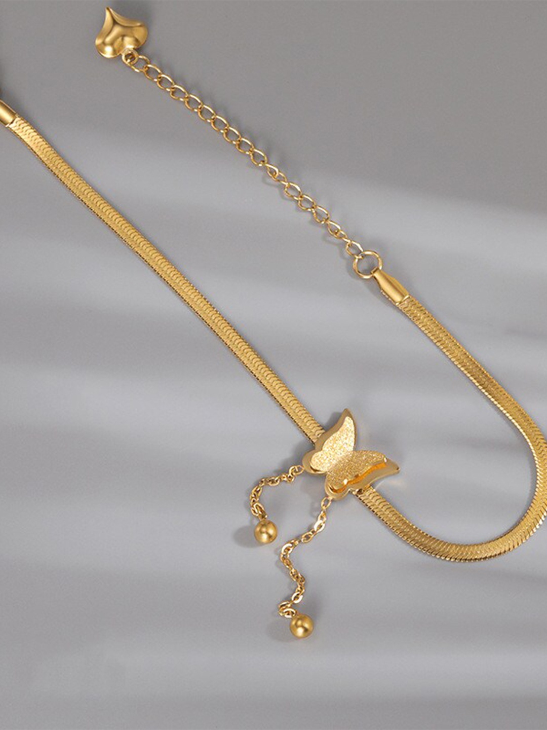 

MYKI Women Gold-Plated Butterfly Link Bracelet