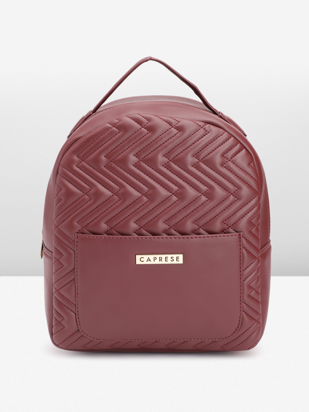 

Caprese Women Chevron Self Design Backpack With Quilted Detail, Maroon