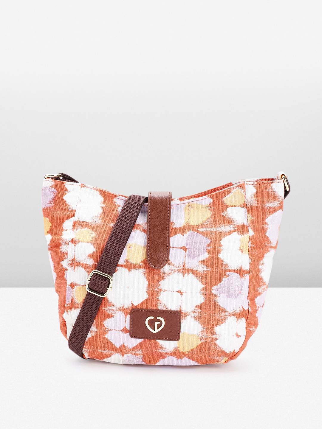 

Caprese Abstract Printed Structured Sling Bag, Rust