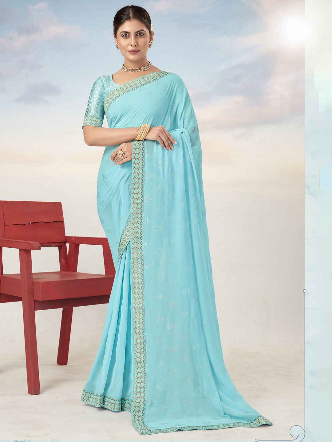 

Saree mall Turquoise Blue Grey Ethnic Motifs Printed Poly Georgette Sarees