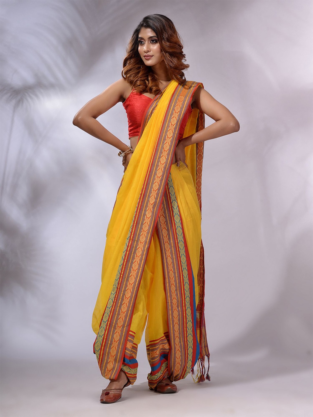 

Charukriti Woven Design Zari Saree, Yellow
