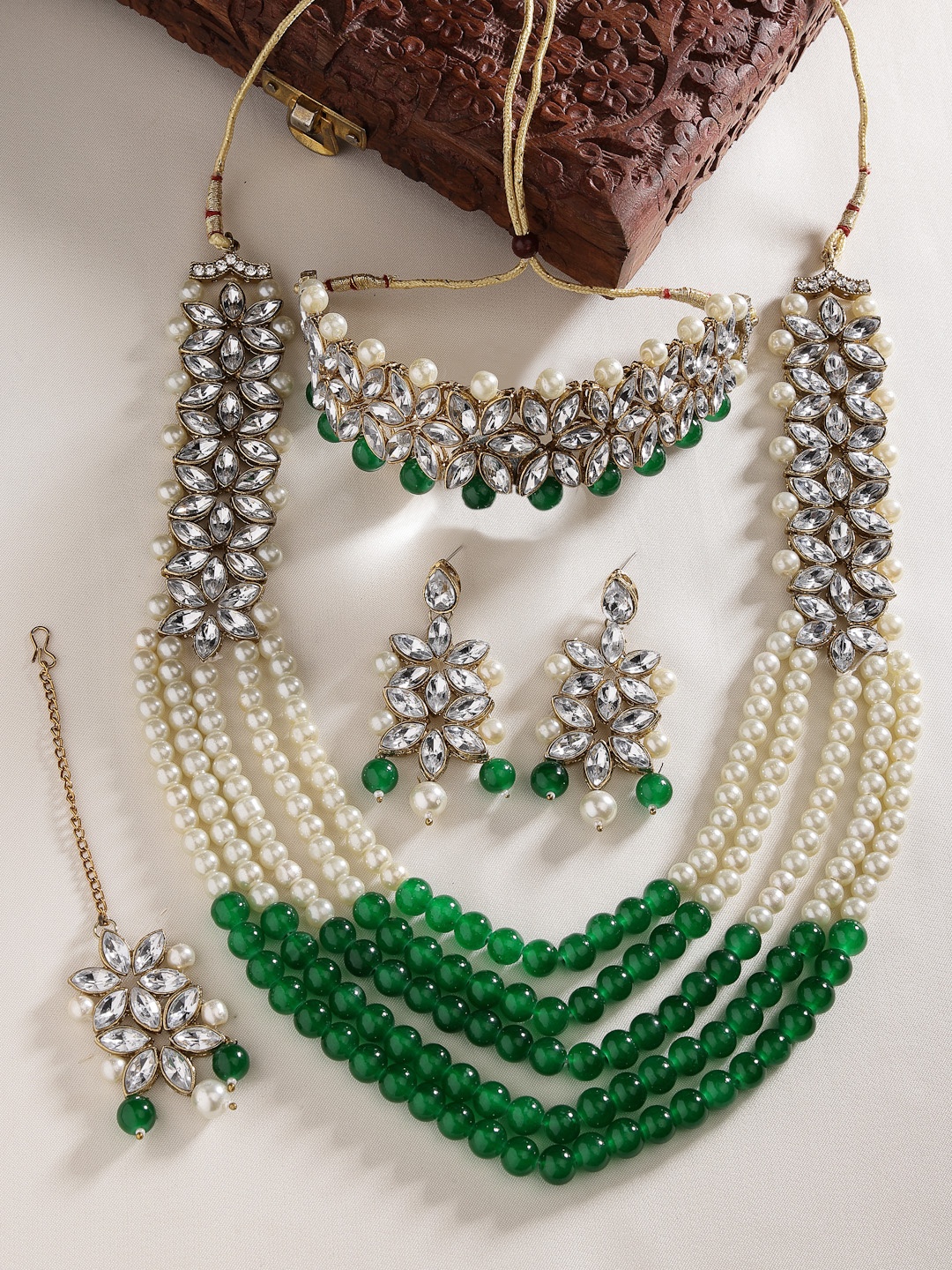 

Aazeen Gold-Plated Kundan-studded & Pearl beaded Antique Jewellery Set With Maang Tikka