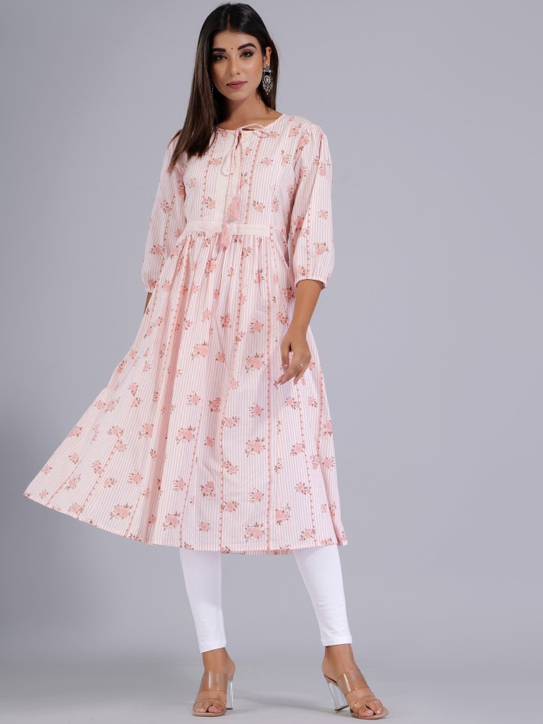

HERE&NOW Peach & White Floral Printed Tie-Up Neck Cotton A-Line Kurta