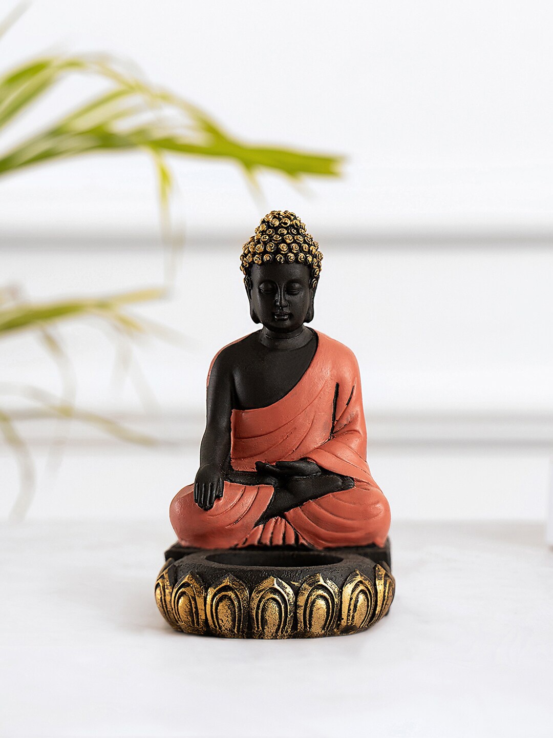 

DecorTwist Black & Peach-Colored Sitting Buddha Idol Showpiece With Tealight Candle Holder