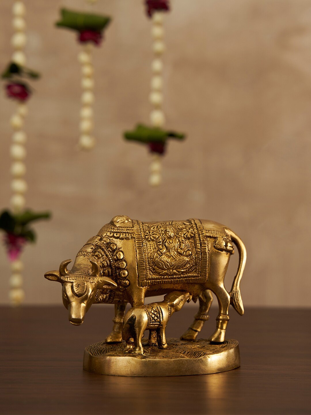 

DecorTwist Gold-Toned Kamdhenu Cow and Calf Figurine Showpiece