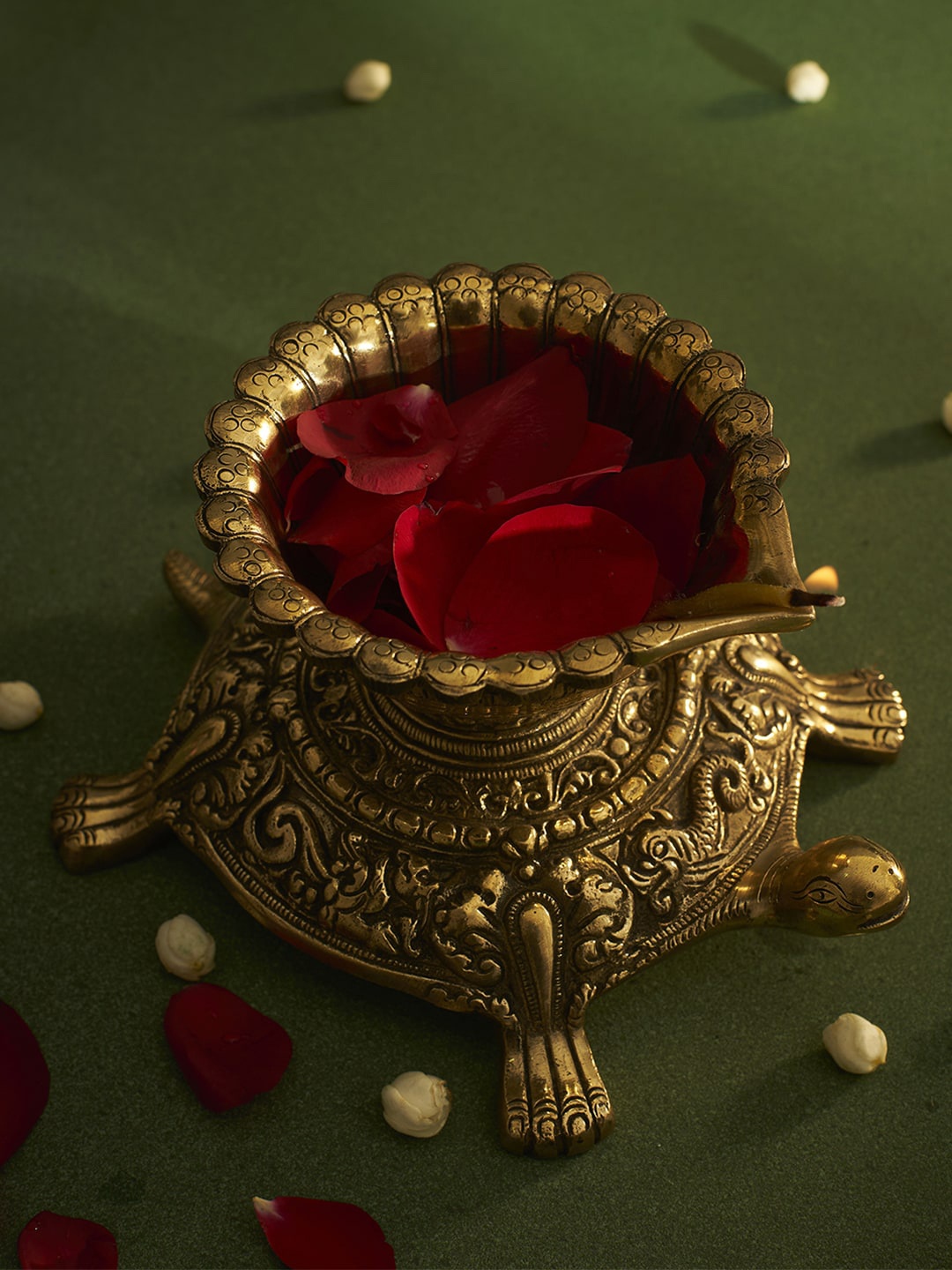 

DecorTwist Gold-Toned Tortoise Diya Brass Showpiece