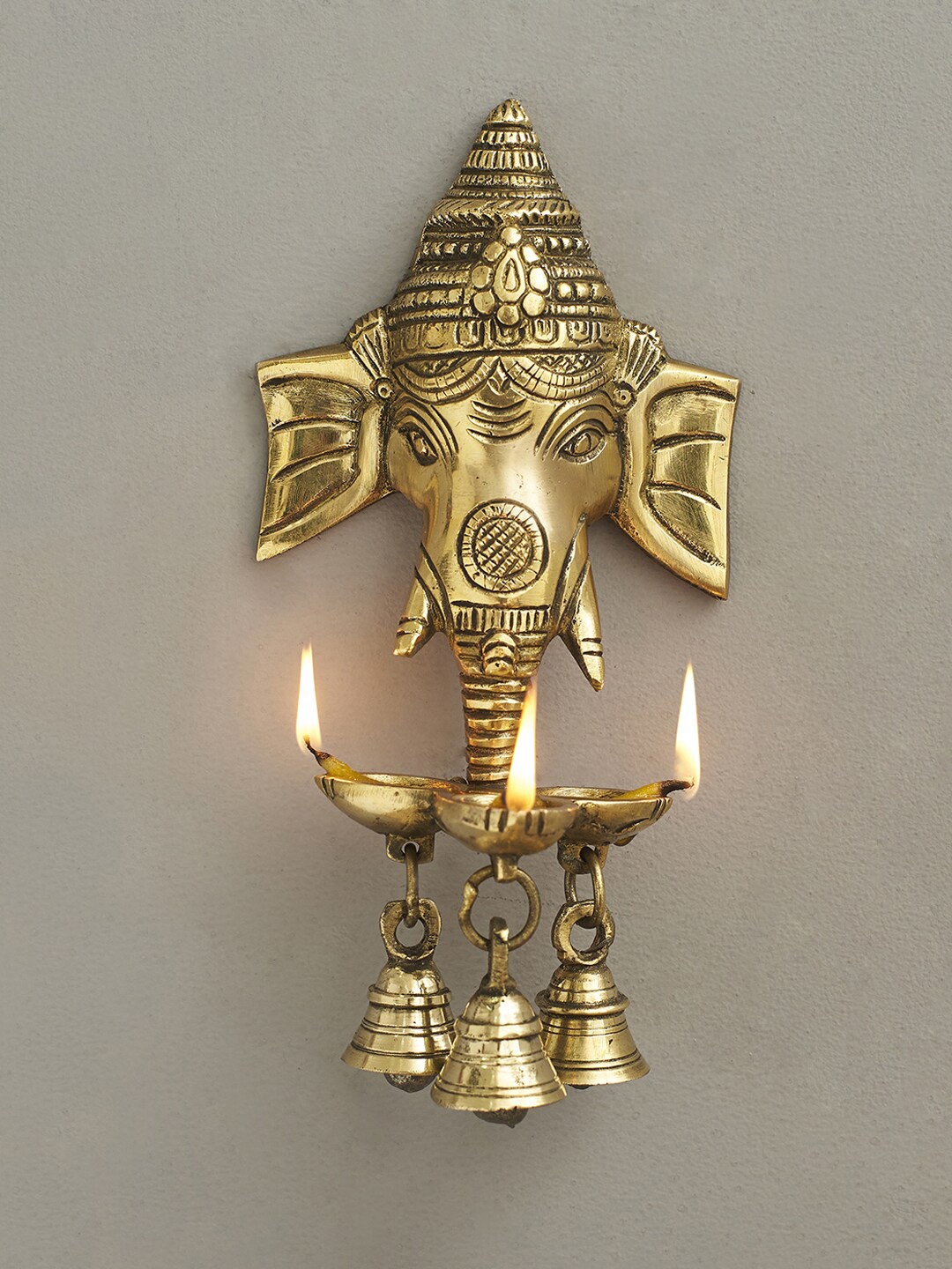 

DecorTwist Brass Antique Lord Ganesha Wall Hanging Diya With Bells, Gold