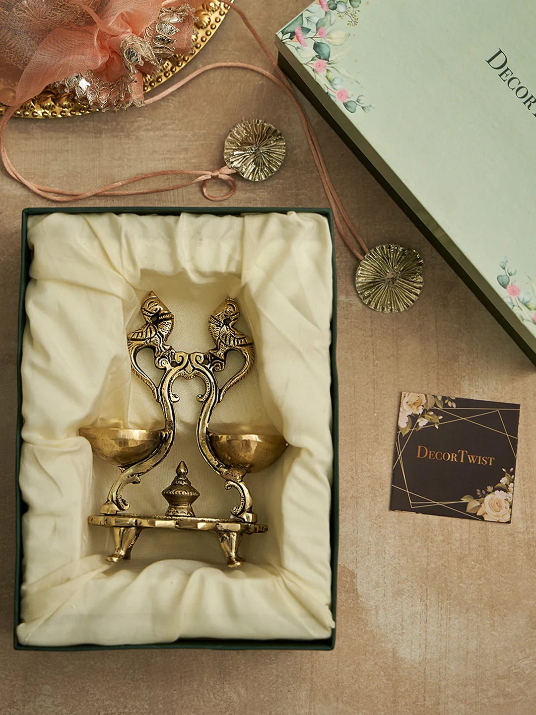 

DecorTwist Golden Peacock Design Twin Oil Wick Brass Diya, Gold
