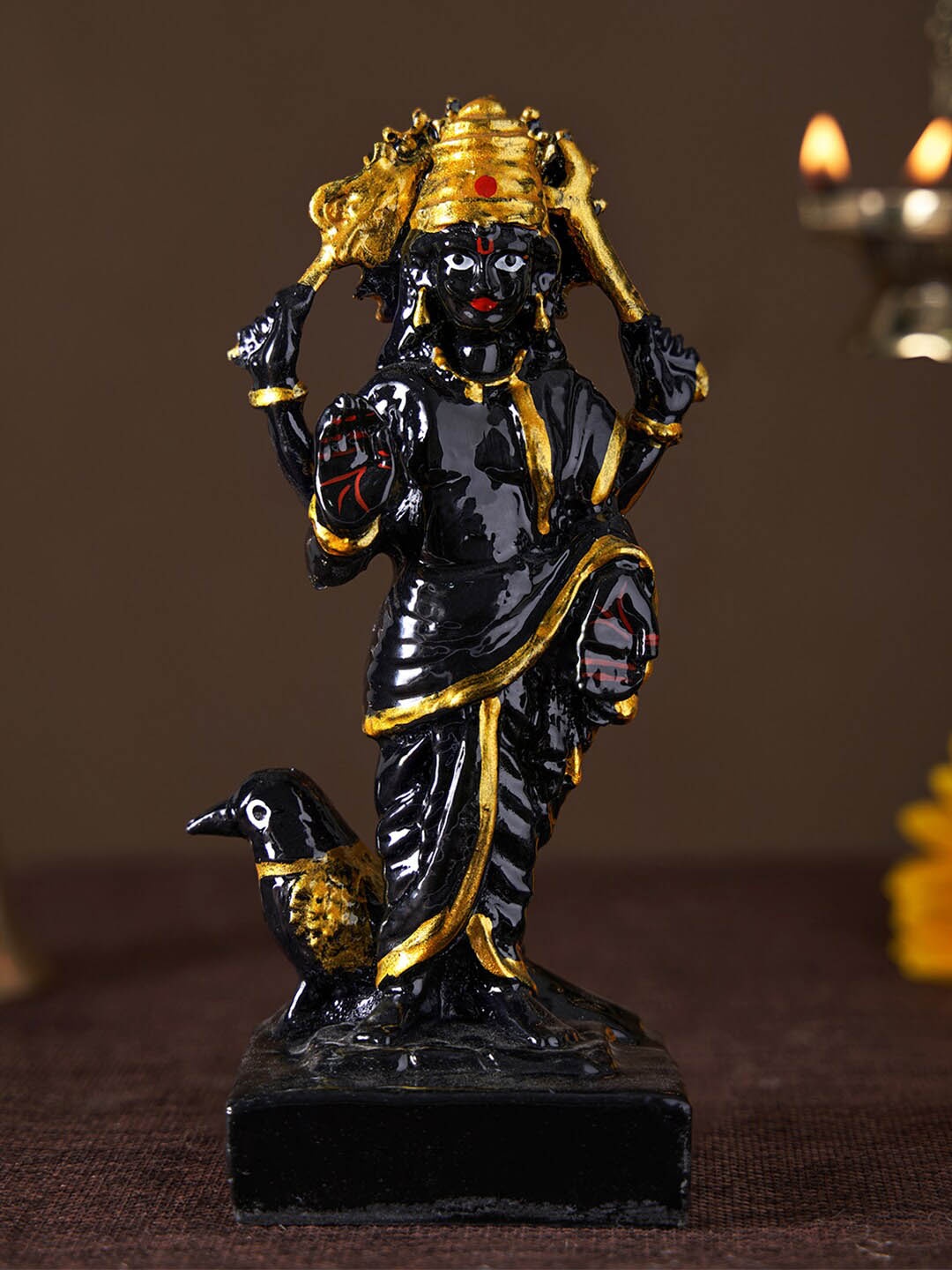 

DecorTwist Black Textured Shani Maharaj Idol Showpiece
