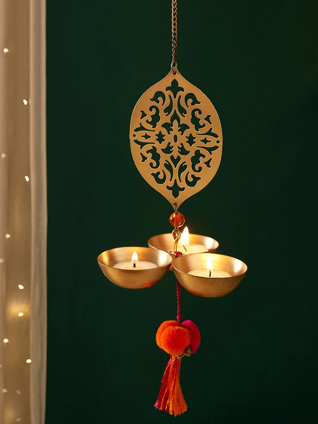 

DecorTwist Gold-Toned Candle Holder