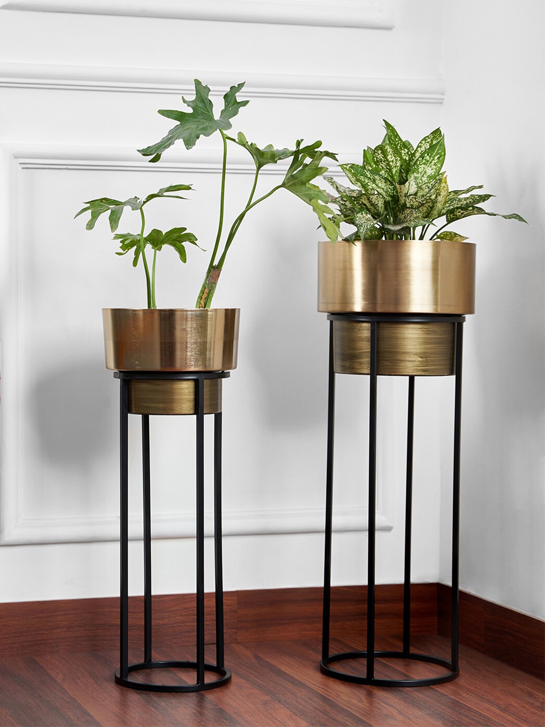 

DecorTwist Gold-Toned 2-Pieces Cylindrical Metal Planters With Stand