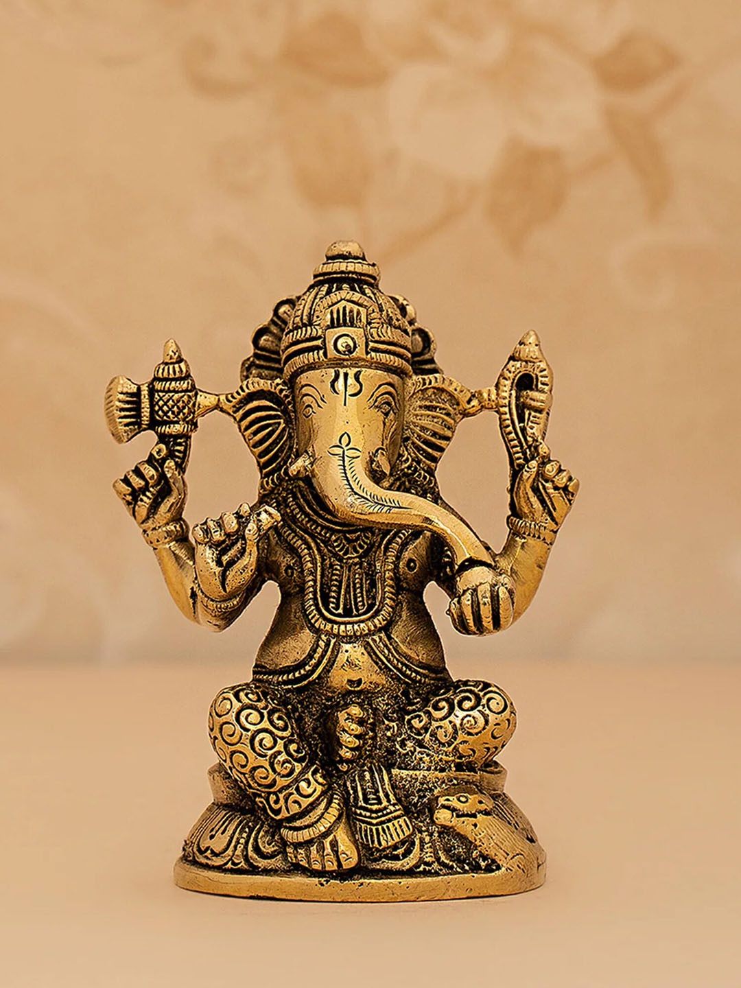 

DecorTwist Golden Sitting Ganesha Idol, Gold