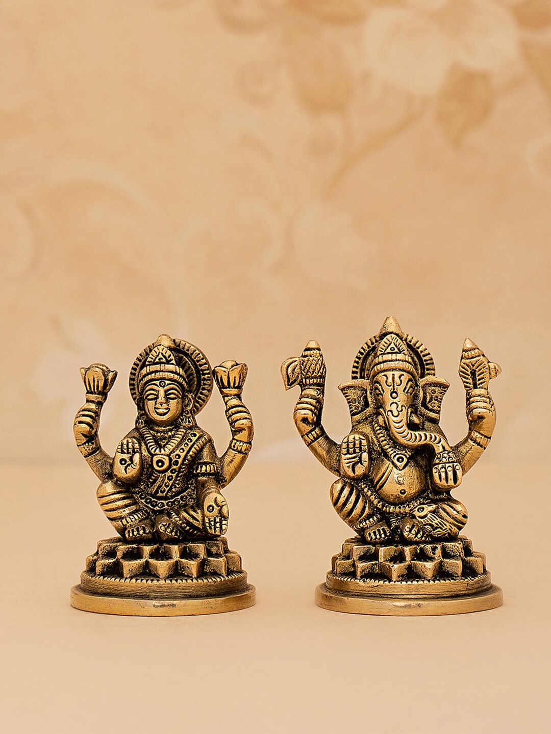 

DecorTwist Gold-Toned Ganesh And Lakshmi Idol Showpiece