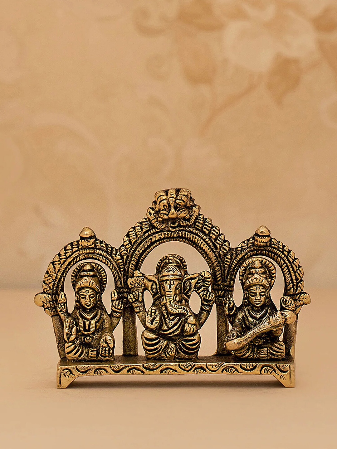 

DecorTwist Gold-Toned Laxmi Ganesh Saraswati Sitting Idol/Statue