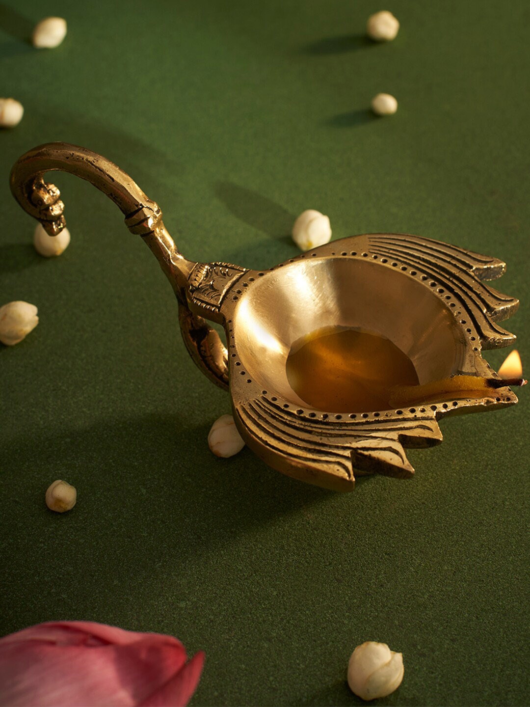 

DecorTwist Gold Toned Brass Lotus Diya With Handle