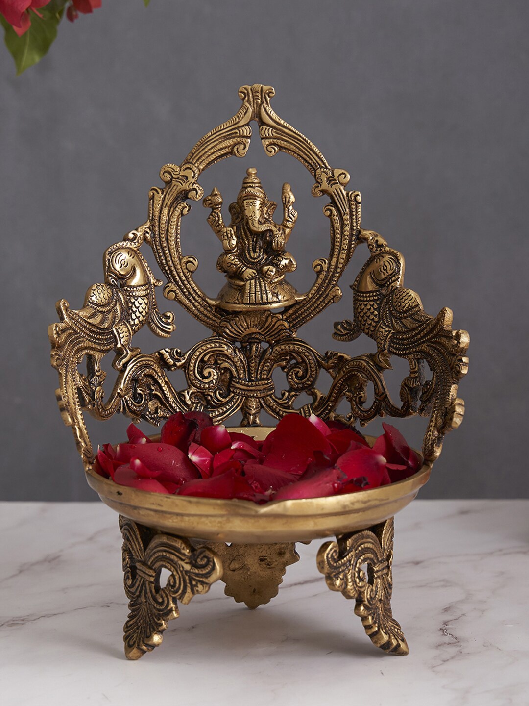 

DecorTwist Golden Brass Antique Lord Ganesha & Peacock Shaped Large Diya/Urli, Gold