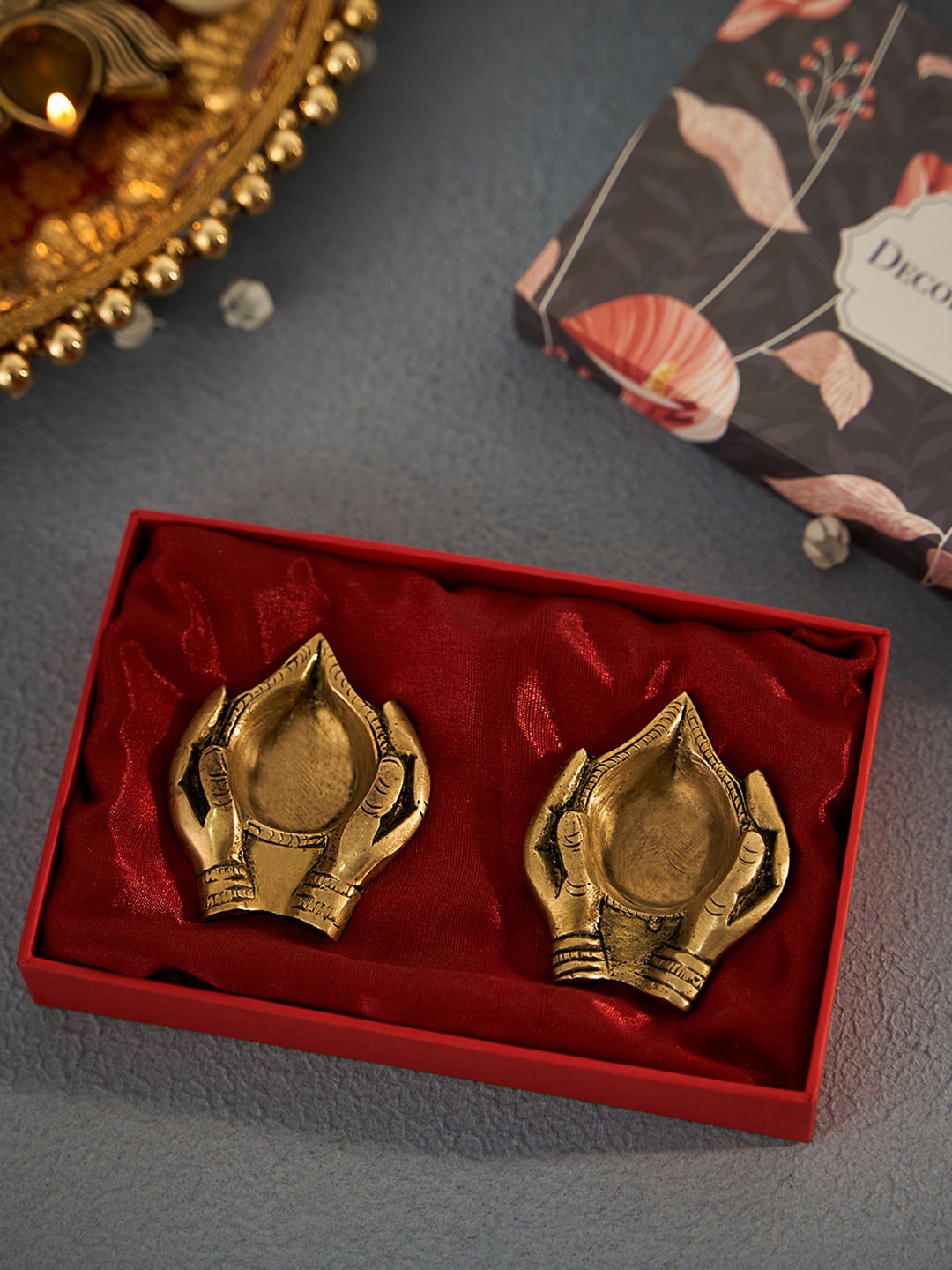 

DecorTwist Gold-Toned 2-Pieces Hand Shaped Diya With Gift Box