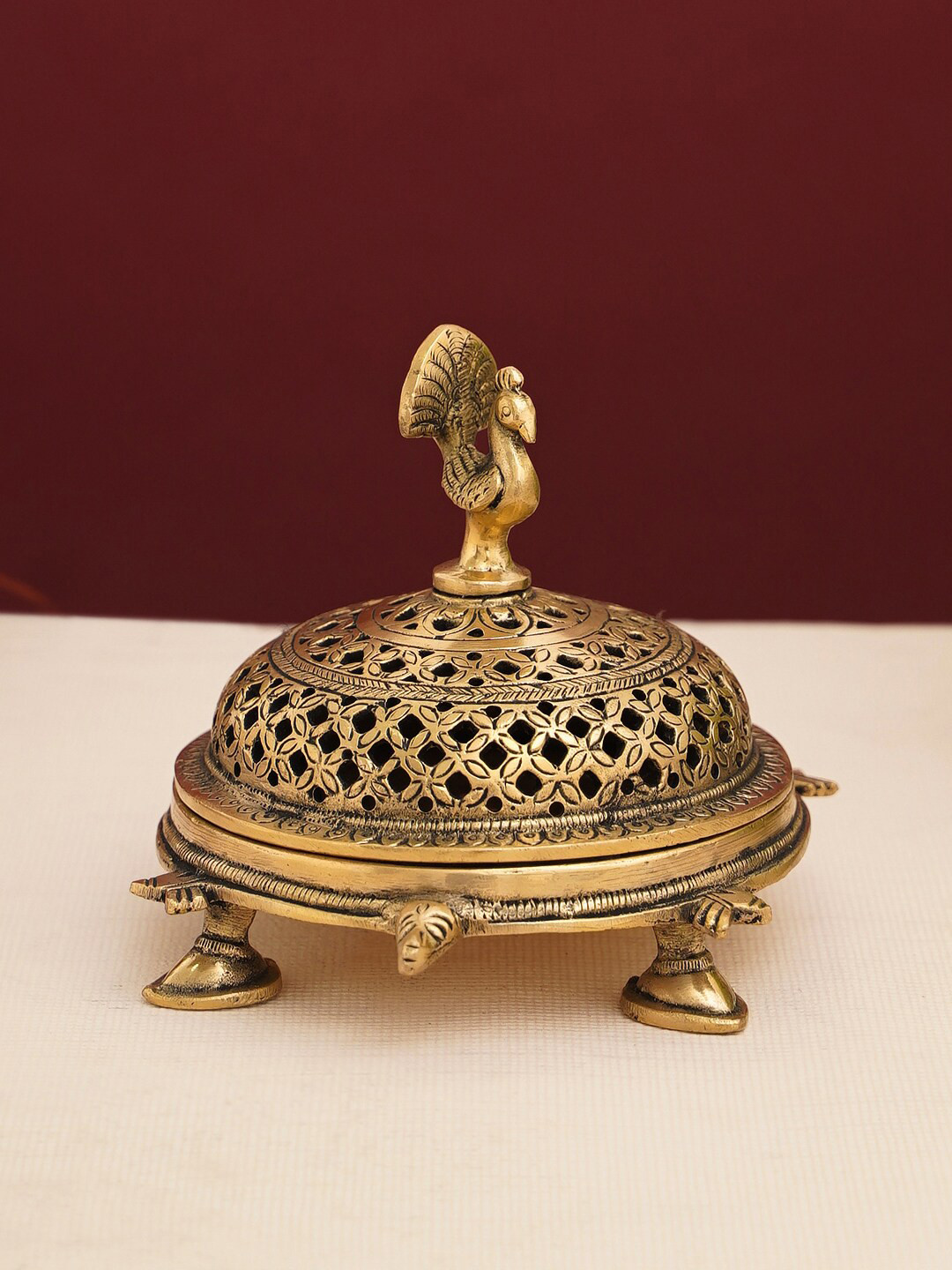 

DecorTwist Brass Antique Peacock Shaped Incense Burner With Tortoise Base, Gold