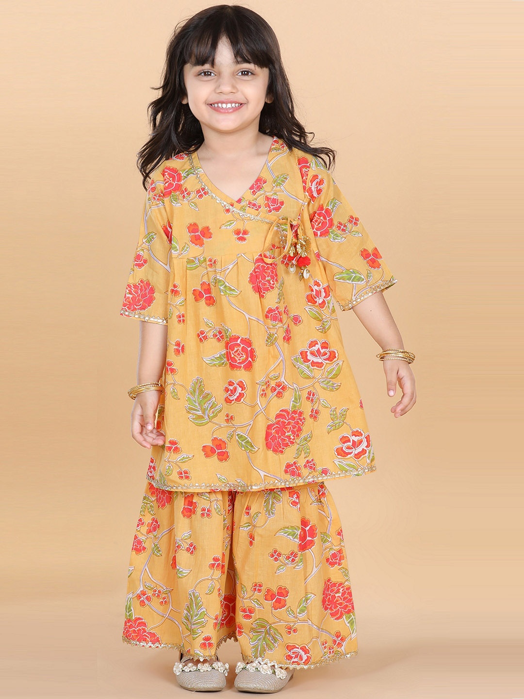 

Aj DEZInES Girls Floral Printed Gotta Patti Angrakha Pure Cotton Kurta with Sharara, Mustard