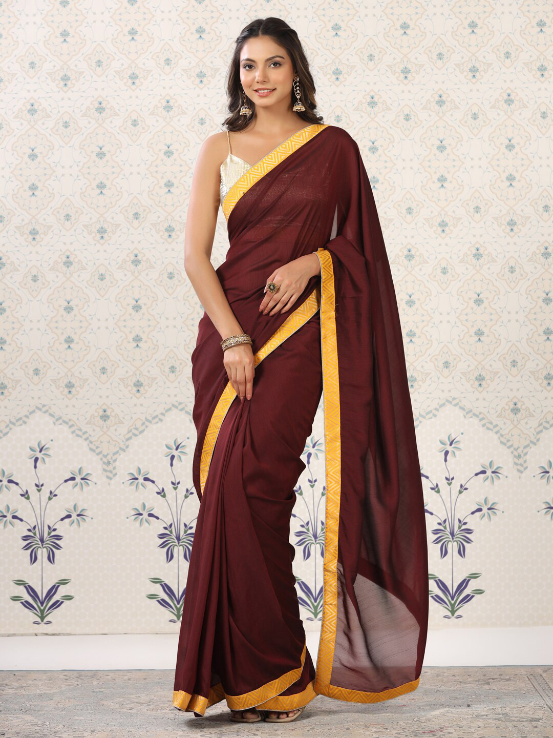 

Ode by House of Pataudi Maroon & Gold-Toned Satin Saree With Woven Design Border