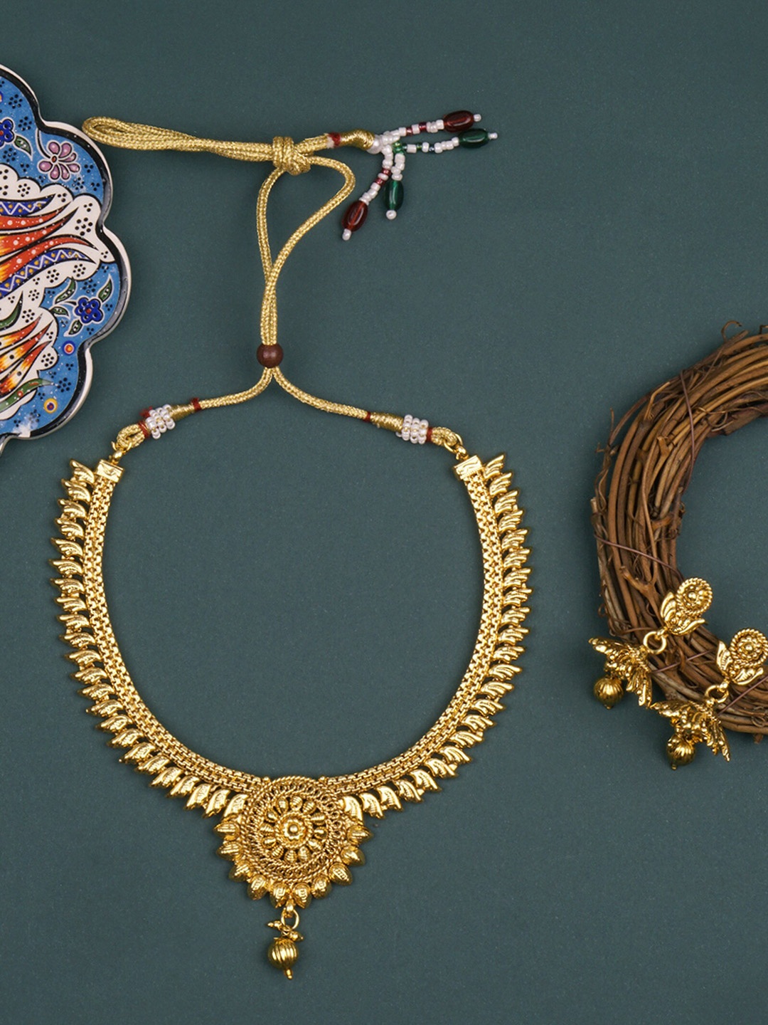 

Matushri Art Gold-Plated Textured Choker Jewellery Set