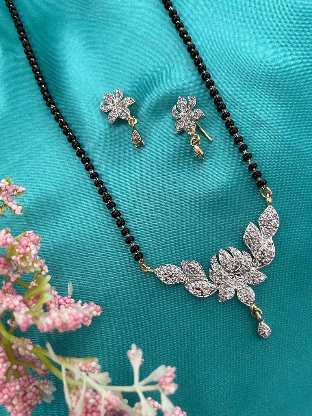 

Digital Dress Room Gold-Plated American Diamond Studded Mangalsutra With Earrings