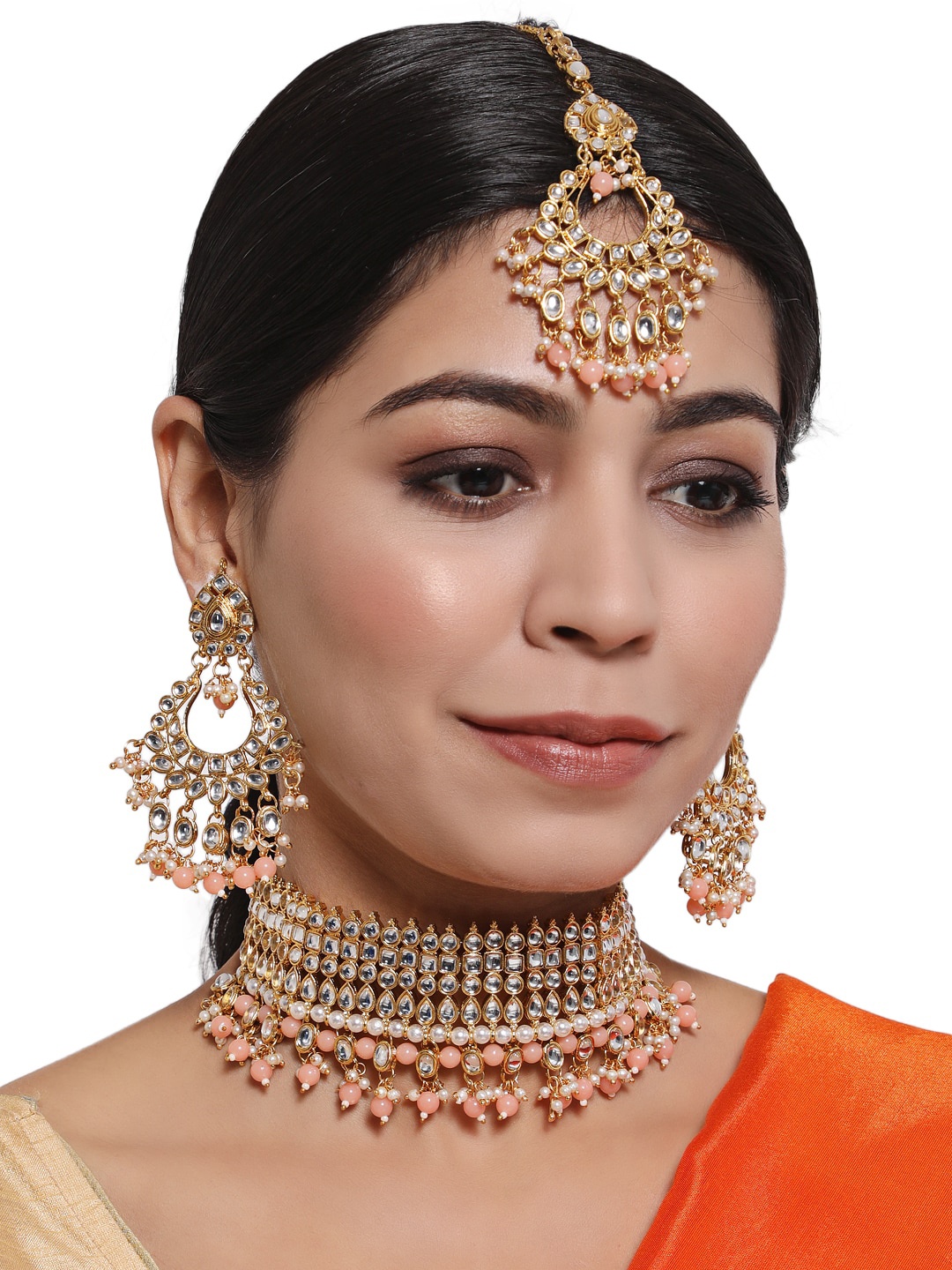 

Anouk Peach Gold-Plated Studded & Beaded Kundan Jewellery Set