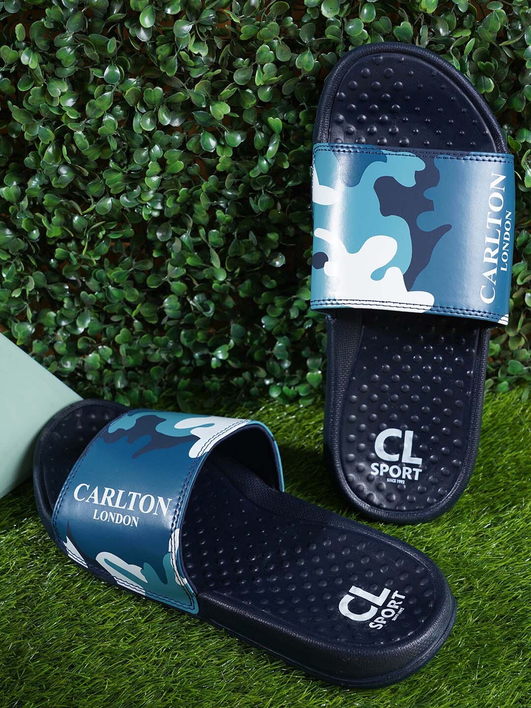 

Carlton London sports Men Brand Logo Printed Sliders, Navy blue