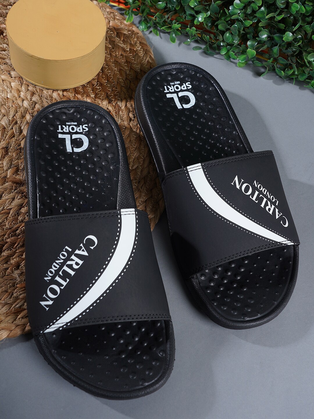 

Carlton London sports Men Brand Logo Printed Sliders, Black