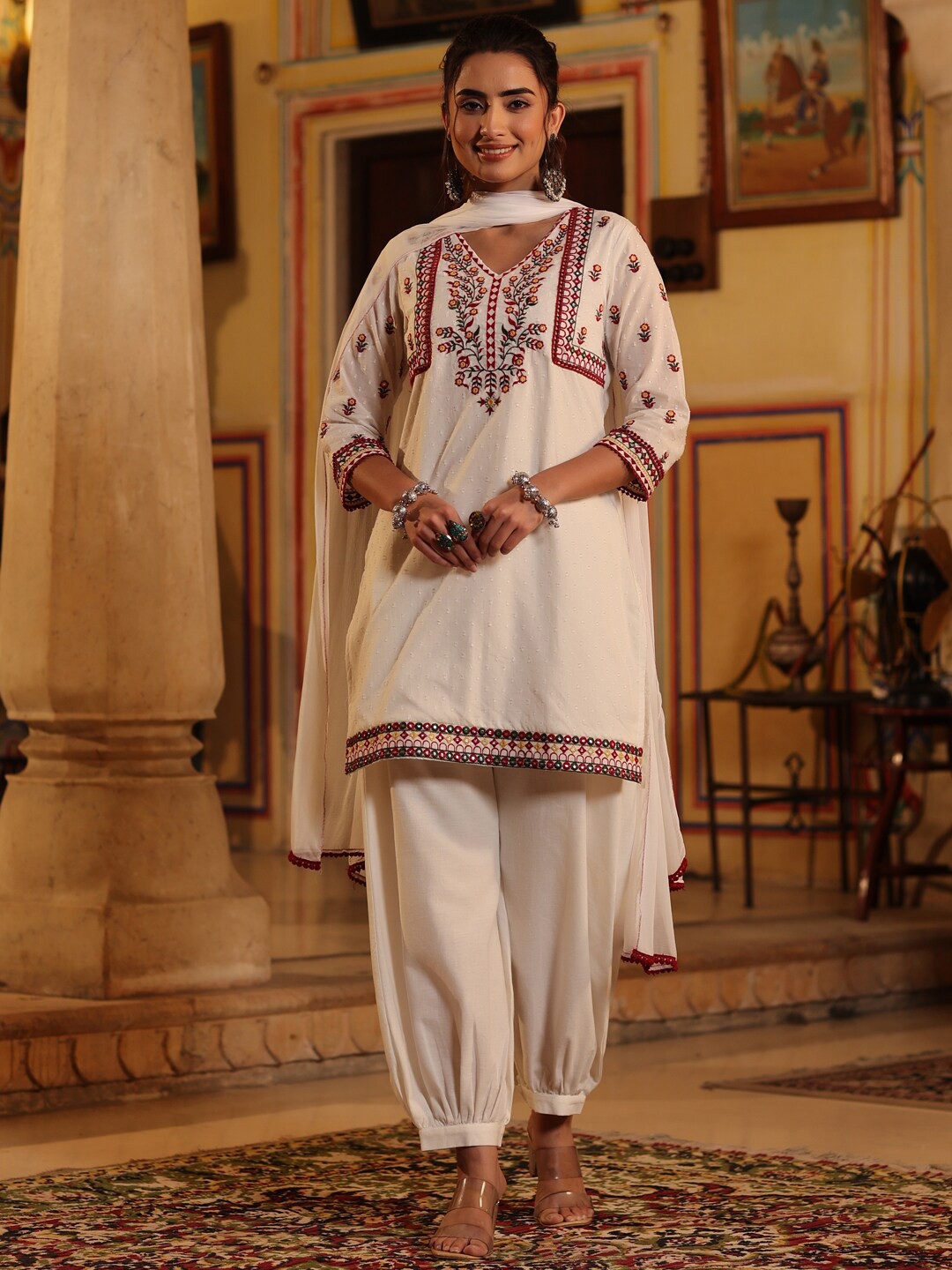 

Juniper White & Red Embroidered V Neck Mirror Work Kurti With Salwar & Dupatta