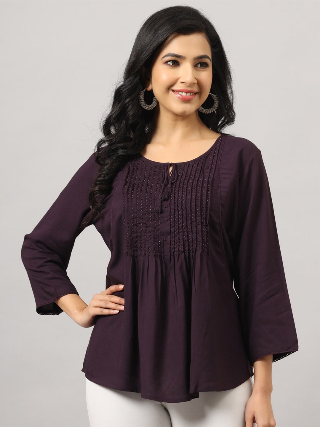 

Amchoor Pleated Empire Top, Maroon