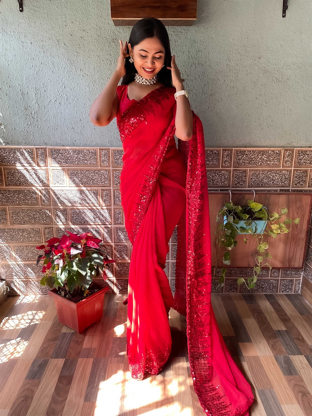 

Mitera Red Sequinned Saree