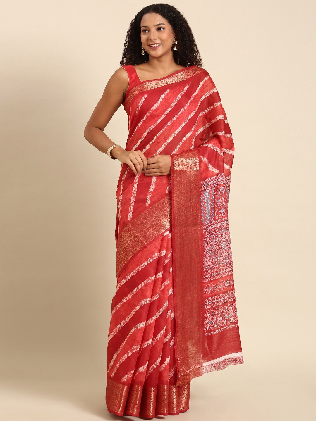 

Anouk Maroon & Gold-Toned Striped Zari Bandhani Saree