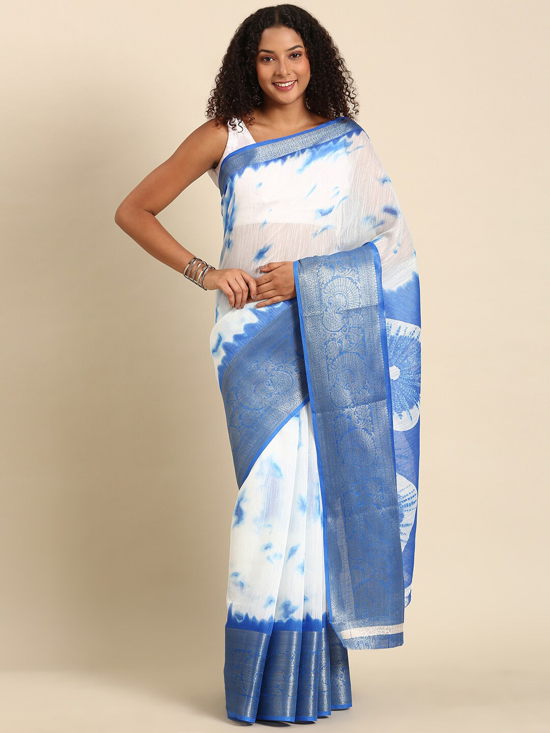 

Anouk Blue & White Bandhani Printed Zari Saree