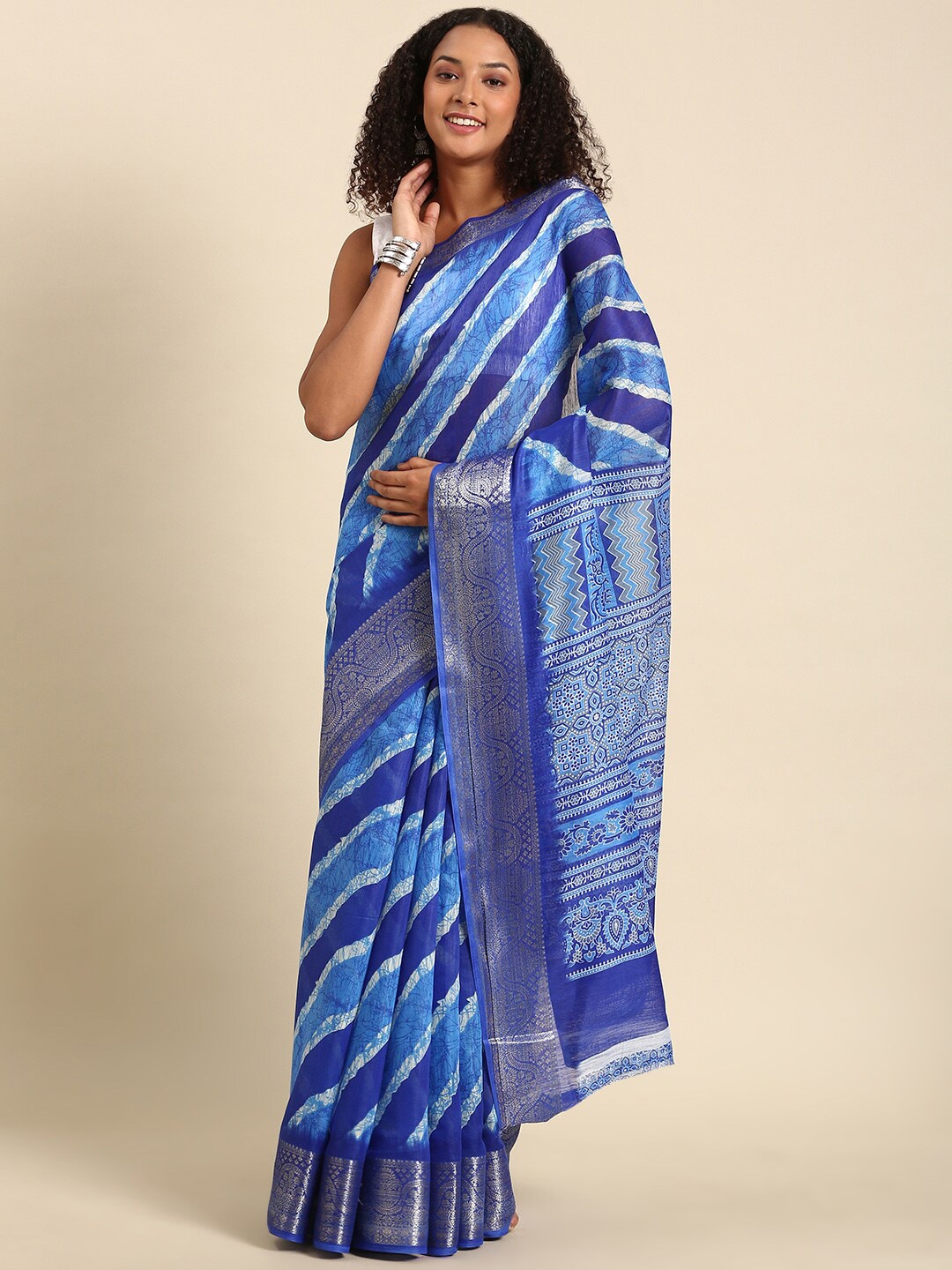 

Anouk Blue & White Striped Zari Bandhani Saree