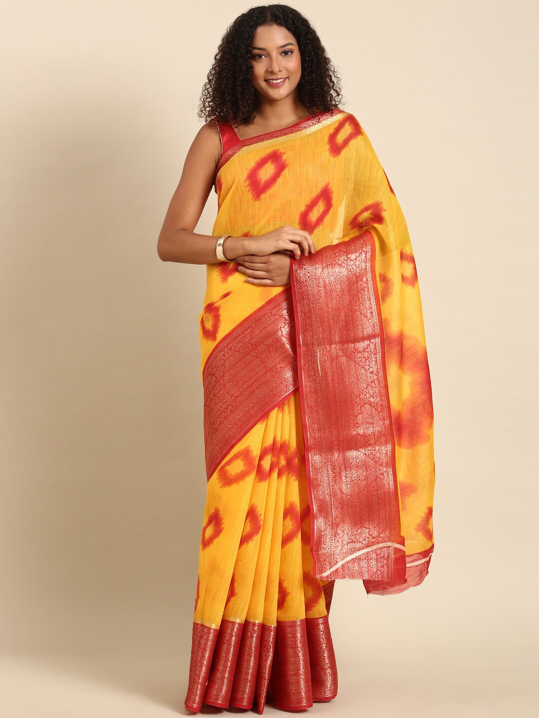 

Anouk Mustard & Red Bandhani Printed Zari Saree