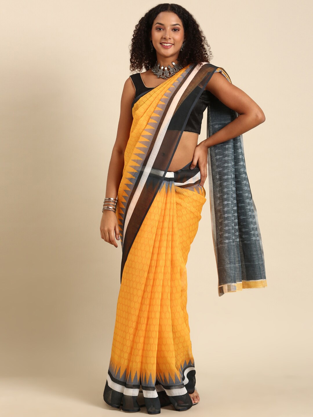 

Anouk Mustard & Black Ethnic Motifs Printed Saree