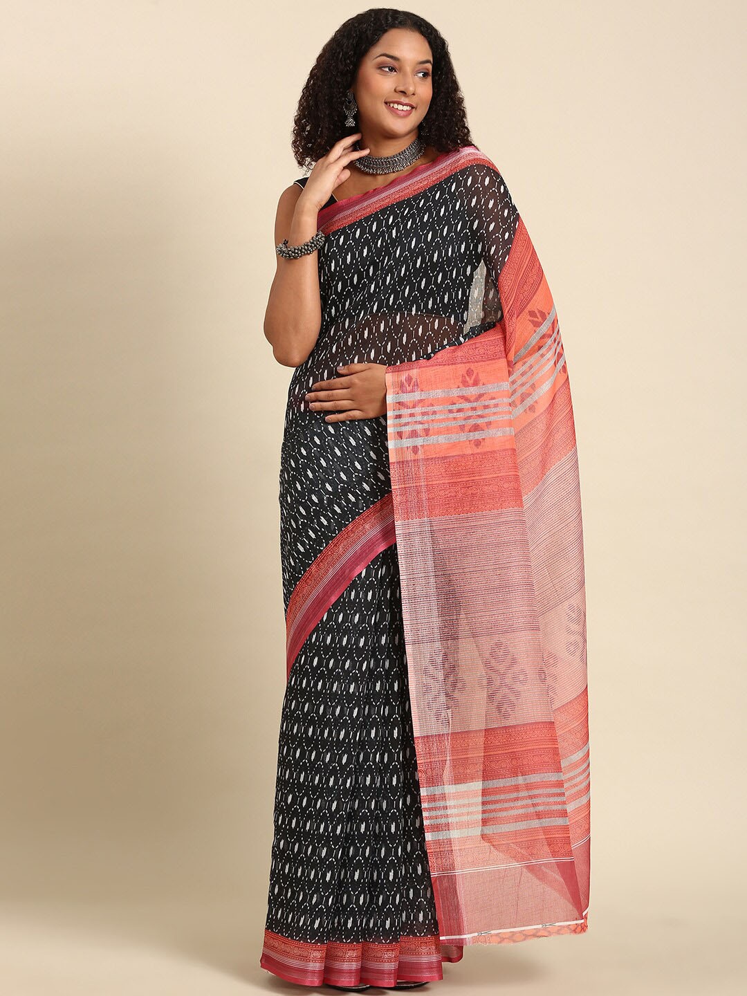 

Anouk Black & Peach-Coloured Ethnic Motifs Zari Printed Saree