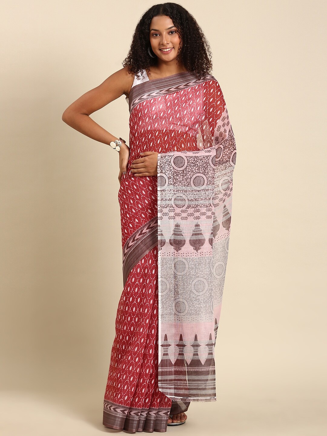 

Anouk Ethnic Motifs Printed Zari Saree, Maroon