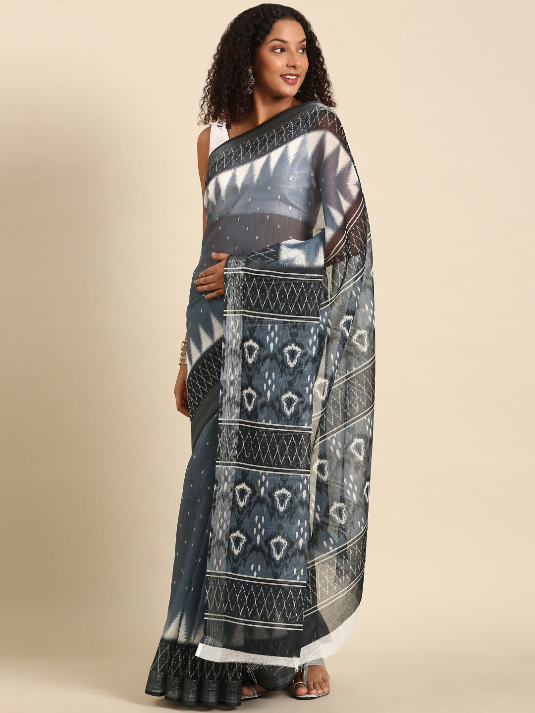 

Anouk Grey & Blue Ethnic Motifs Zari Saree