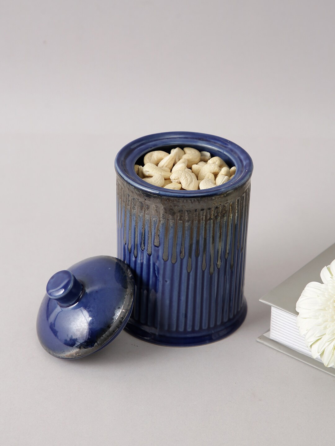 

Aapno Rajasthan Blue & Black Cylindrical Ceramic Storage Jar