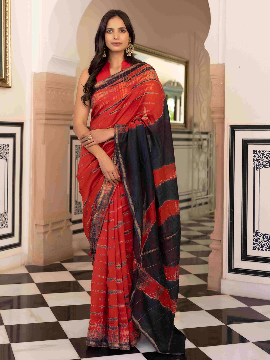 

Ragavi Red Tie And Dyed Pure Cotton Chanderi Saree