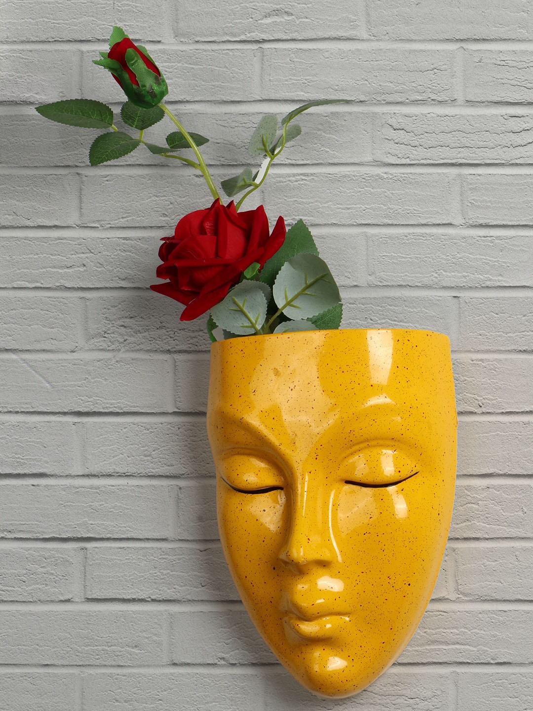 

Stylespace by Isha Yellow Printed Face Shaped Fiber Wall Planter