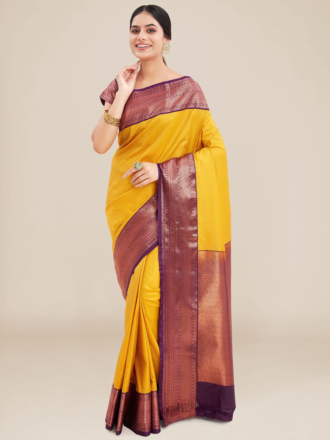 

Kalyan Silks Ethnic Motif Woven Design Zari Silk Cotton Saree, Yellow