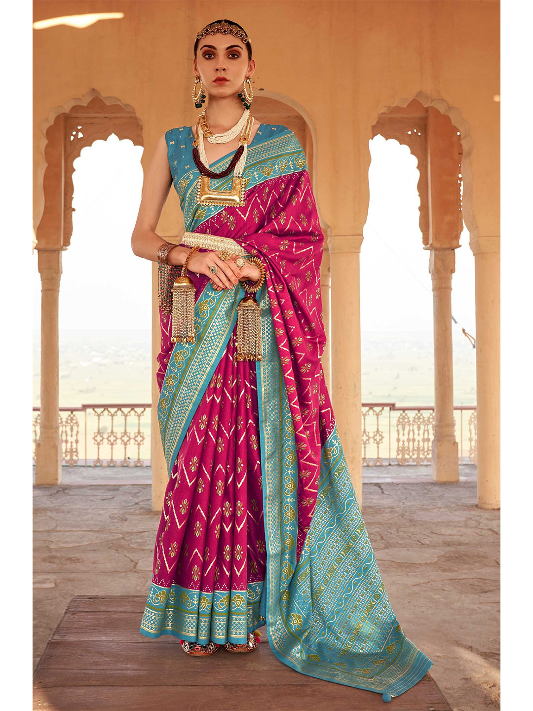 

Mitera Ethnic Motifs Silk Blend Patola Saree With Blouse Piece, Pink