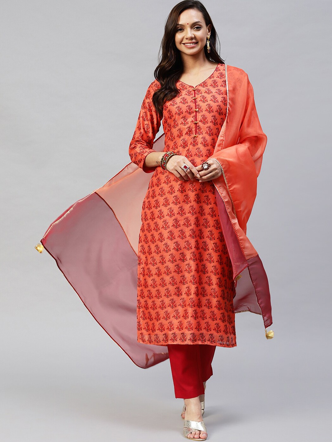 

KALINI Floral Printed V Neck Kurta With Trousers & Dupatta, Orange