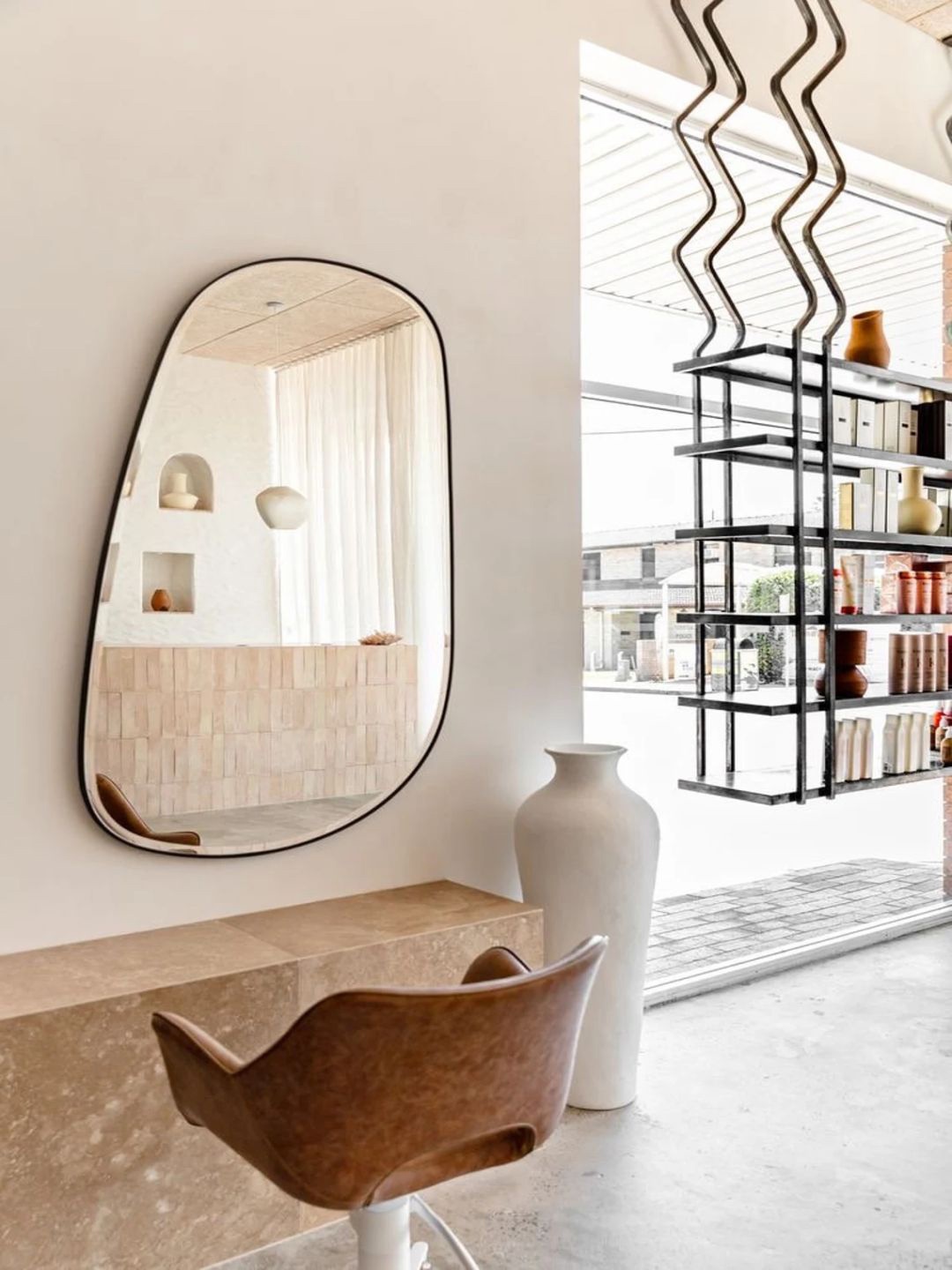 

THE HANDMADE FLAIR Black MDF Framed Irregular Wall Mirror