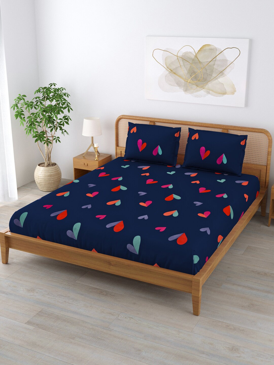 

Clasiko Navy Blue & Orange Graphic 220 TC Cotton Fitted King Bedsheet With 2 Pillow Covers