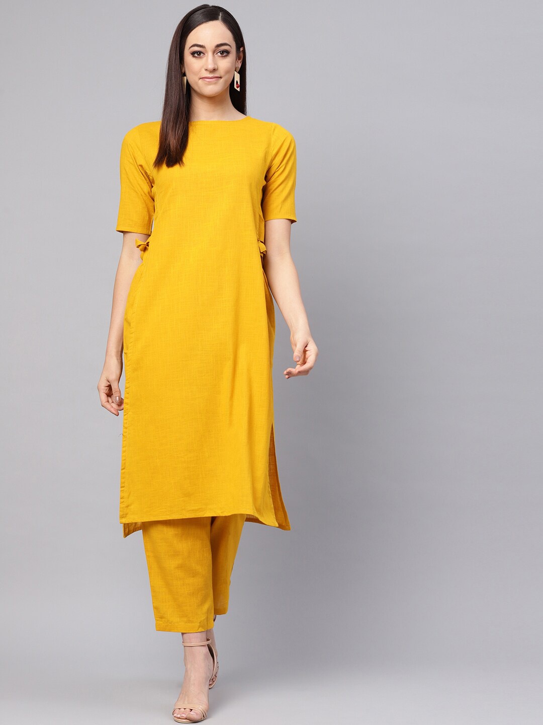 

Idalia Boat Neck High Slit Jute Cotton Kurta with Trousers, Mustard